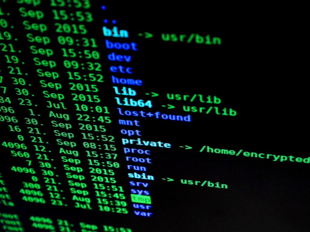 Programming code on a black screen computer